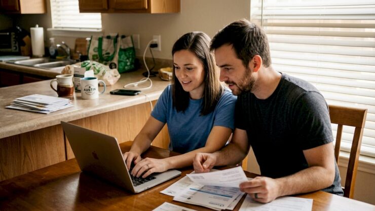 Texas couple using laptop to activate electricity